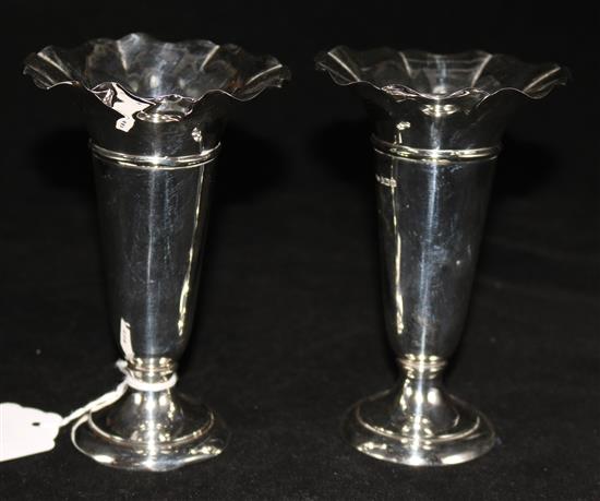 A pair of George V silver posy vases, 5.5in.